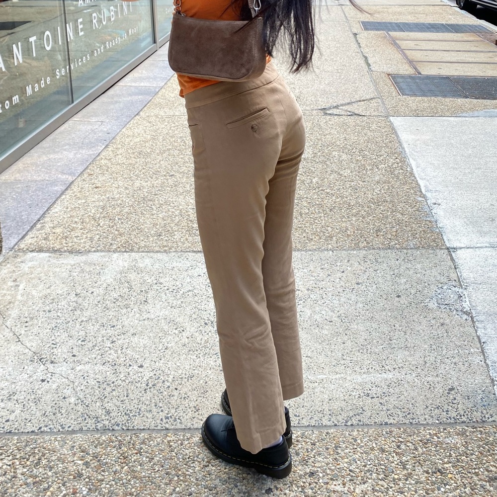 Tan work pants with button pockets felty material